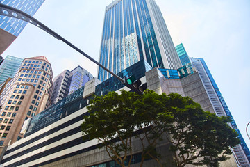 Obraz premium High glass skyscrapers on the streets of Singapore