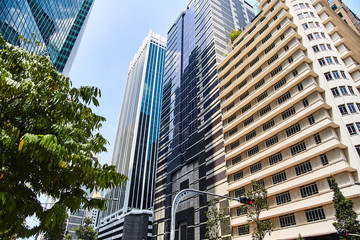 Obraz premium High glass skyscrapers on the streets of Singapore