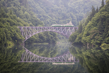 Fototapeta premium Tadami railway line and Tadami River in summer season at Fukushima prefecture.