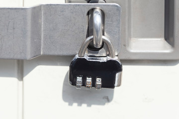 Small padlock at the door