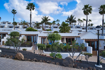 Fototapeta na wymiar Holiday apartments next to Playa Flamingo, Playa Blanca, Lanzarote, Spain
