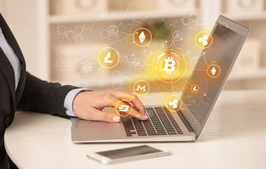 Business woman working on tablet with cryptocurrency bitcoin link network and online concept
