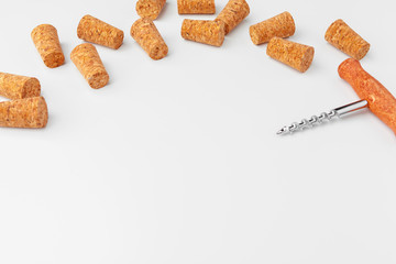 corkscrew and wine cork isolated on white background