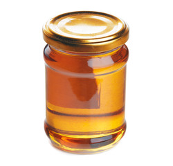 Glass jar with sweet honey isolated on white background