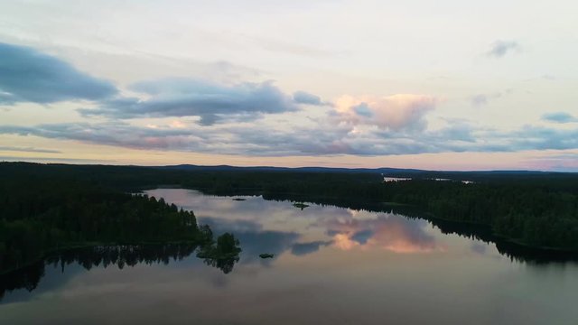 drone footage over river and forest in Finland Arctic circle