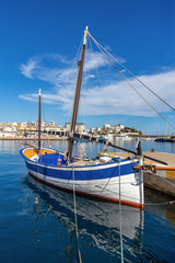 Traditional sail ships in the harbor Palamos in Costa Brava of Spain