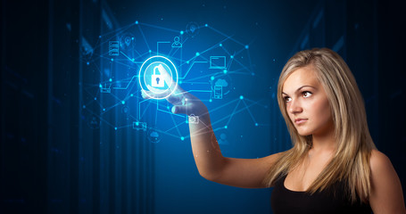 Woman touching hologram projection displaying cloud system 

