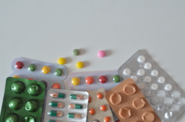 Different medicines: tablets, pills in blister pack, medications drugs, macro, selective focus, copy space