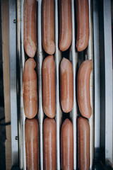 Sausages for hot dog on the grill