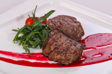 Beef steak with berry sauce