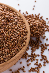 Grain buckwheat on a white acrylic background
