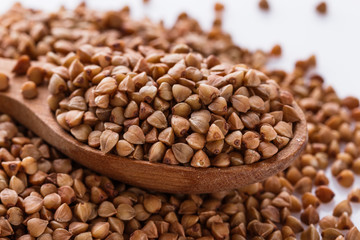 Grain buckwheat on a white acrylic background