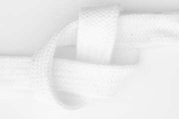 Close up of white shoe/bootlace