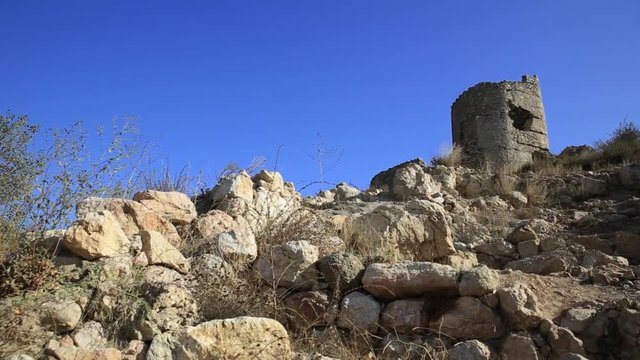 Cembalo Genoese fortress on the territory of Balaklava, a suburb of Sevastopol. Ancient architectural landmark on clear blue sky background. Crimea, Russia.