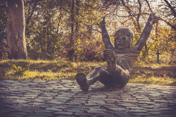 Scultpture of a boy in a park