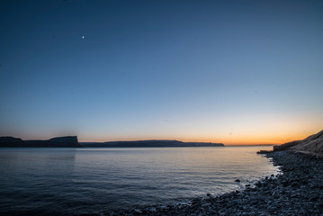 Warm sunset over a calm sea horizon © joangasconcomas