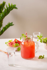 red water melon in glass on food table 