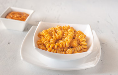 Portion of pasta with tomato and ricotta pesto