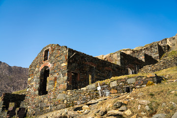 Fototapeta na wymiar Abandoned buildings on mountain