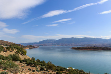 Bin El Ouidane, Azilal Province, Béni Mellal-Khénifra, Morocco - November 3, 2012: Panoramic view of the artificial lake of Bin el Oiudane located 1 km east of the village of the same name.