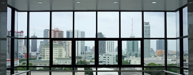The interior of the building's view of the city from the office windows.
