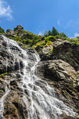Fototapeta na wymiar The waterfall called Balea on the Transfagarasan road from Fagaras mountains