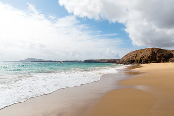 Panorama of beautiful beach and tropical sea of Lanzarote. Canaries