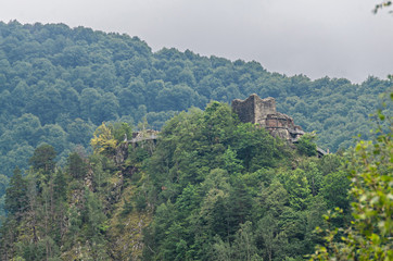 Fototapeta na wymiar Poenari Castle, known as Poenari Citadel, green mountains.