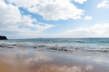 Panorama of beautiful beach and tropical sea of Lanzarote. Canaries