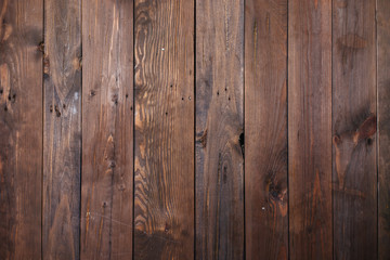 Fototapeta premium Background of brown boards, nailed together with nails.