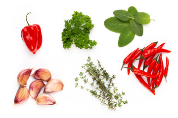 Spice herbal leaves and chili pepper on white background. Vegetables pattern. Floral and vegetables on white background. Top view, flat lay. - obrazy, fototapety, plakaty
