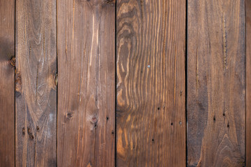 Naklejka premium Background of brown boards, nailed together with nails.
