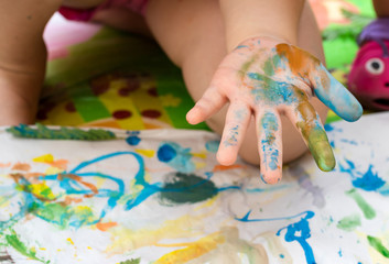 Obraz na płótnie Canvas Child paint with watercolors. Education concept.