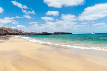 Panorama of beautiful beach and tropical sea of Lanzarote. Canaries
