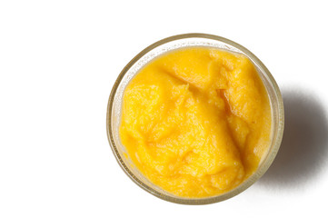Grinded orange in bowl isolated on a white background.Fruit