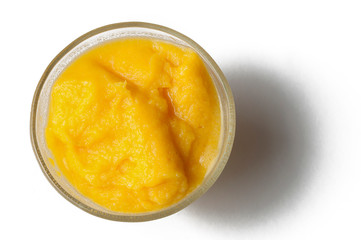 Grinded orange in bowl isolated on a white background.Fruit