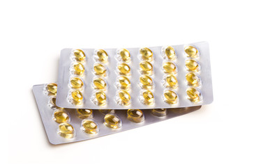 Blister pack of fish oil capsules isoated on white