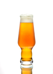 A glass of light beer on a white background, isolated