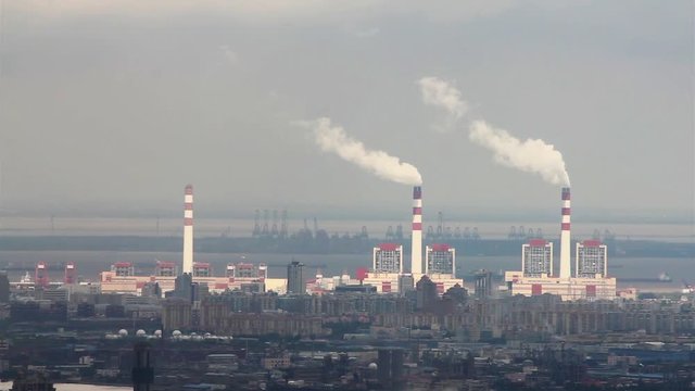 View of factory near by coastline in Pudong District , Shanghai, China