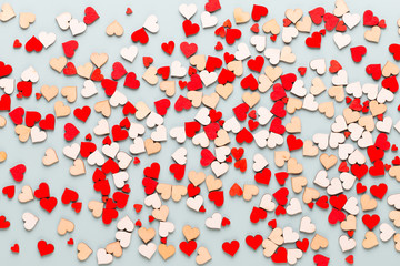 Happy Valentines day background. With small hearts on pastel background.