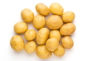 New potato and rosemarin isolated on white background close up.