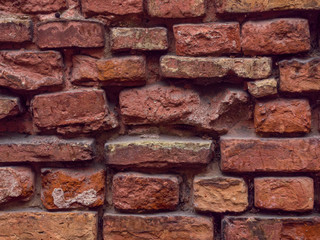 Empty Vintage Red Brick Wall Texture. Building Facade With Scratch Damage