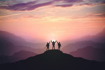 Silhouette of the team on the mountain