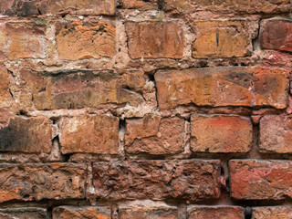 Empty Vintage Red Brick Wall Texture. Building Facade With Scratch Damage