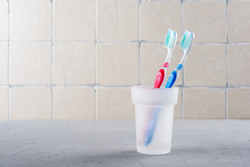 Two Toothbrush on the shelf in the bathroom