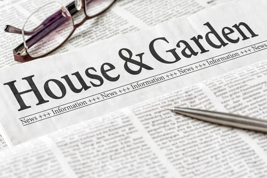 A newspaper with the headline House and Garden