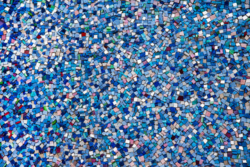Part mosaic as decorative texture background. Selective focus. Abstract Pattern. Abstract blue and black colored ceramic stones - obrazy, fototapety, plakaty