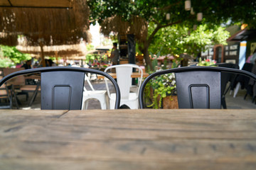 Fototapeta na wymiar Wooden table in the cafe