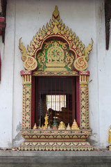 window in a buddhist temple (wat phra sing) in chiang mai (thailand)