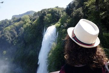 The girl admires Marmore waterfalls
